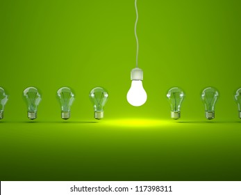 Row Of Light Bulbs On Green Background