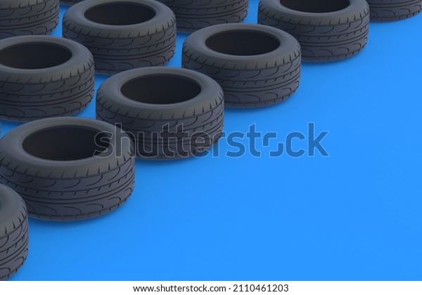 Rows of car tyres on blue background. Automotive\
parts. Traffic safety. Automobile service. Buying, selling of\
tires. Copy space. 3d\
render