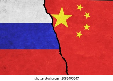 Russia and China painted flags on a wall with a crack. Russia and China relations. China and Russia flags together. Russia vs China