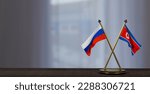 Russia and North Korea flags on table. Negotiation between North Korea and Russia. on little blur background. 3D work and 3D image