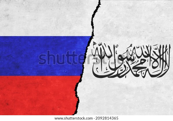 Russia and Taliban painted\
flags on a wall with a crack. Russia and Taliban relations. Islamic\
Emirate of Afghanistan and Russia flags together. Russia vs\
Taliban