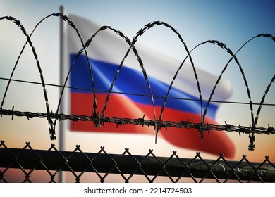 Russian Flag Behind Barbed Wire Fence. Freedom And Propaganda In Russia Concept. 3D Rendered Illustration.