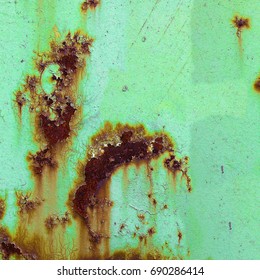 Rust Spots On Metal. Rust On Green Paint