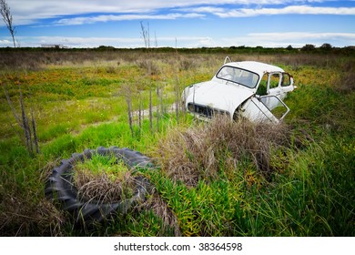 Rusty Car In The Field
