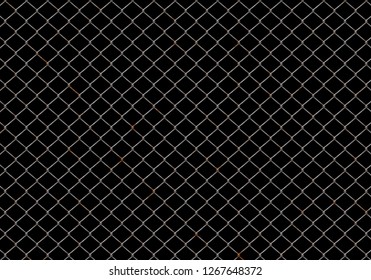 rusty chainlink fence on black background