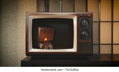 Sad Paperboy In A Vintage TV Box