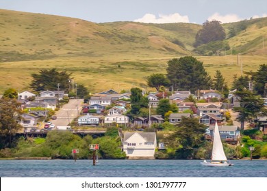 Sailboat Returning To The Town Of Bodega Bay On The Eastern Side Of Bodega Harbor Along The Sonoma County Coast Of Northern California, USA, With Digital Oil-painting Effect