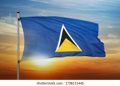 Saint lucia flag waving with cloudy blue sky. saint lucia realistic 3D waving flag.