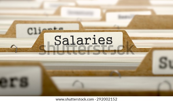 Salaries Concept. Word on Folder Register of Card\
Index. Selective\
Focus.