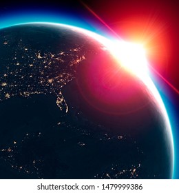 Satellite view of the Earth seen from space. The sun rising over the United States. Cities illuminated in the night. Sunrise