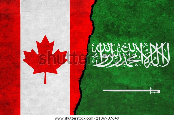 Saudi Arabia and Canada painted flags on a wall\
with a crack. Saudi Arabia and Canada relations. Canada and Saudi\
Arabia flags\
together
