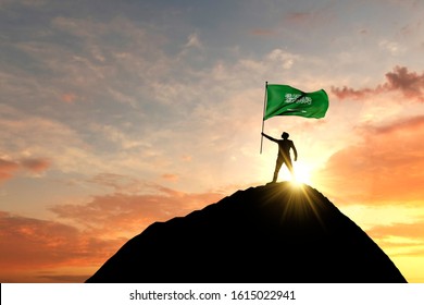 Saudi Arabia Flag Being Waved At The Top Of A Mountain Summit. 3D Rendering