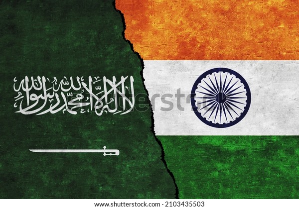 Saudi Arabia and India painted flags on a wall\
with a crack. Saudi Arabia and India relations. India and Saudi\
Arabia flags\
together