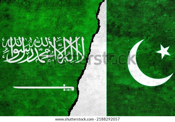 Saudi Arabia and Pakistan painted flags on a\
wall with a crack. Pakistan and Saudi Arabia relations. Saudi\
Arabia and Pakistan flags\
together