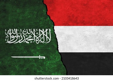 Saudi Arabia And Yemen Painted Flags On A Wall With A Crack. Saudi Arabia And Yemen Conflict. Yemen And Saudi Arabia Flags Together