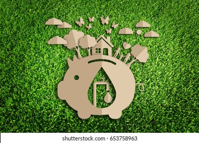  Save water concept. Paper cut of eco on green grass.
