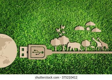  Save the world concept. Paper cut of eco on green grass.