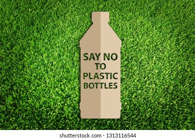 Say no to plastic bottles. Paper art style of Eco concept on green grass background. Save the earth. - Powered by Shutterstock