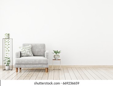 La pared interior de estilo escandinavo se burla de sillón de terciopelo gris, almohada y plantas sobre fondo de pared blanca. Representación 3d.