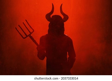 Scary devil silhouette. halloween theme