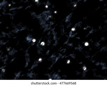 Scattered planet shaped objects on a cloudy black sky.