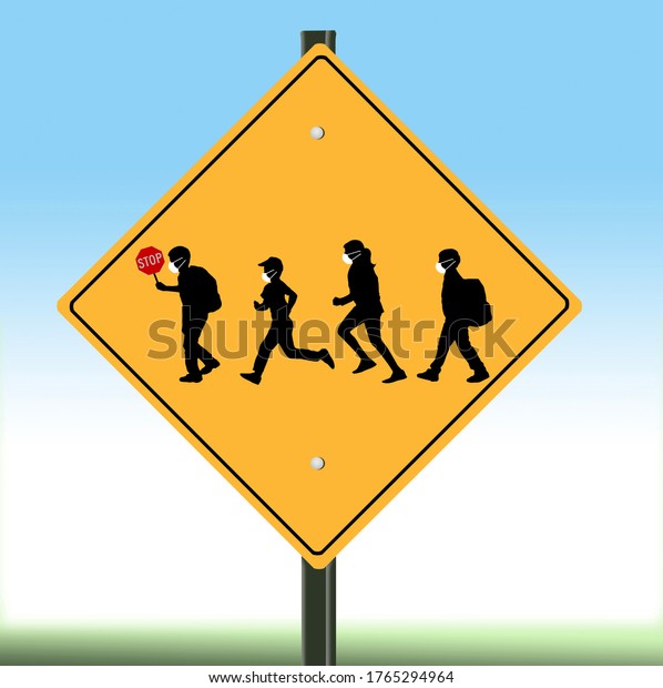 A school crossing sign includes silhouettes\
of children wearing surgical masks in light of the Covid-19\
pandemic and it’s effects on\
education.