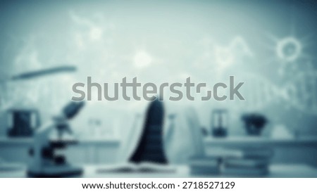 Science Lab Workspace Microscope with DNA, and and Research on Blur Backdrop.