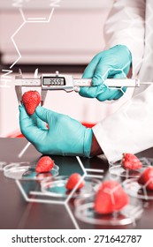 Science And Medical Graphic Against Food Scientist Measuring A Strawberry