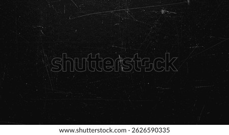Scratched black surface with intersecting fine lines and a subtle gritty texture, ideal for grunge or sci-fi visual effects.
