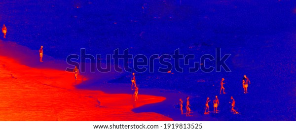 Sea and beach.\
Reverse image where people walk on water. Jesus and then his 12\
disciples walk on water concept - profane miracle now.  Thermal\
impressionism.\
Conceptualism