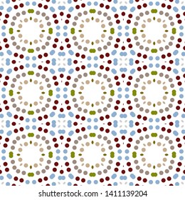 Seamless abstract pattern background with a variety of colored circles.