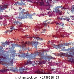 Seamless abstract pattern in shades of pink, purple, and cream. Highly textured and grungy ornamental design for surface pattern print and textile design. Layers overlaid with multiply filter.