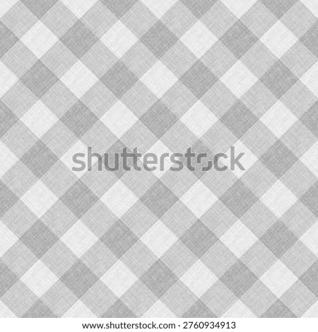 Seamless grey gingham plaid pattern with linen fabric texture. Classic diagonal buffalo check background for textiles, tablecloths, and scrapbooking.