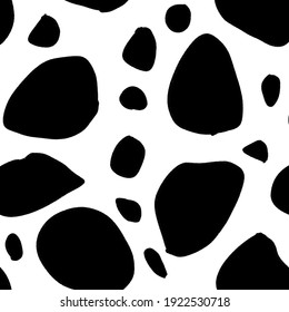 seamless pattern of cow skin. black and white background. 