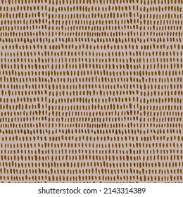 Seamless pattern drawing of ink dashes. Homogeneous brown background in ethnic style.