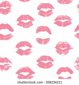 Seamless pattern with lipstick kisses. Imprints of lipstick of light pink shades isolated on a white background. Can be used for design of fabric print, wrapping paper or romantic greeting card