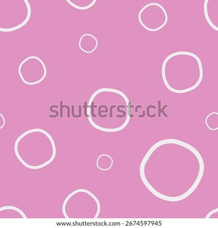 Seamless pattern made from circle in white color on bashful pink background