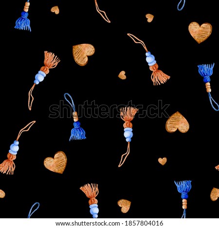 Seamless pattern with tassels of blue and beige yarn with strung beads. Wooden Hearts on black.
Watercolor hand-drawn  elements. Perfect for home decor, Happy New Year cards and Merry Christmas