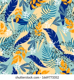 Seamless pattern of tropical leaves and flowers
