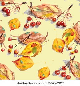 seamless pattern of watercolor drawing set of autumn leaves and small ornamental paradise apples on a yellow background