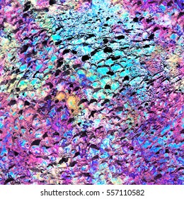 Seamless stone texture with bright violet and turquoise colors. Opalescent background. Holographic effect.