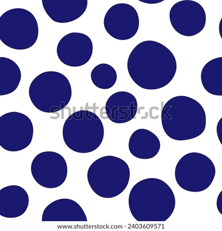 Seamless vector pattern of hand drawn polka dots, random spots in various sizes. Big and small dark circles in blue and white. Stylish monochrome abstract background. Simple retro design elements.	