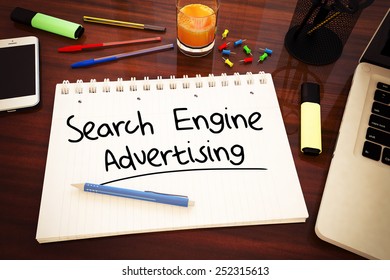 Search Engine Advertising - Handwritten Text In A Notebook On A Desk - 3d Render Illustration.
