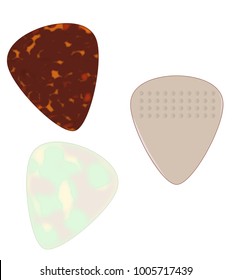 A Selection Of Guitar Pics Isolated Over A White Background.