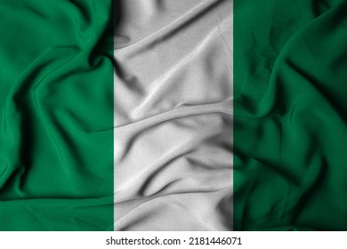 Selective Focus Of Nigerian Flag, With Waving Fabric Texture. 3d Illustration