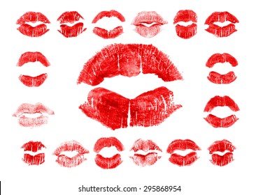 Set of 17 imprint of red lipstick. Silhouettes of red lips isolated on white background. Qualitative trace of real lipstick texture. Can be used as a decorative element for print or design.