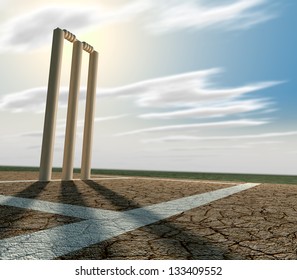 A set of cricket wickets set up on a cracked cricket pitch with white markings on a blue sky background