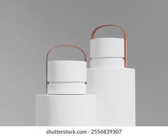 Set of cylindrical shape gift boxes with leather holder mockup, Luxury hat box display isolated on clean background, short tube rigid paper tube packaging with hand grip holder, small round container