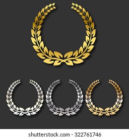 Set Of Golden, Silver, Brass And Platinum Award Laurel Wreaths, Isolated On Black Background. 