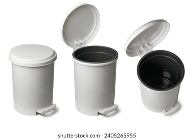 set of pedal bins or pedal trash cans, indoor waste disposal containers that have foot pedal mechanism for hands free operation, used in kitchens, bathrooms or offices, isolated on white background